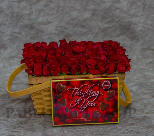 Dazzling Red Roses Flowers And A Packet of Milka Chocolate Hamper