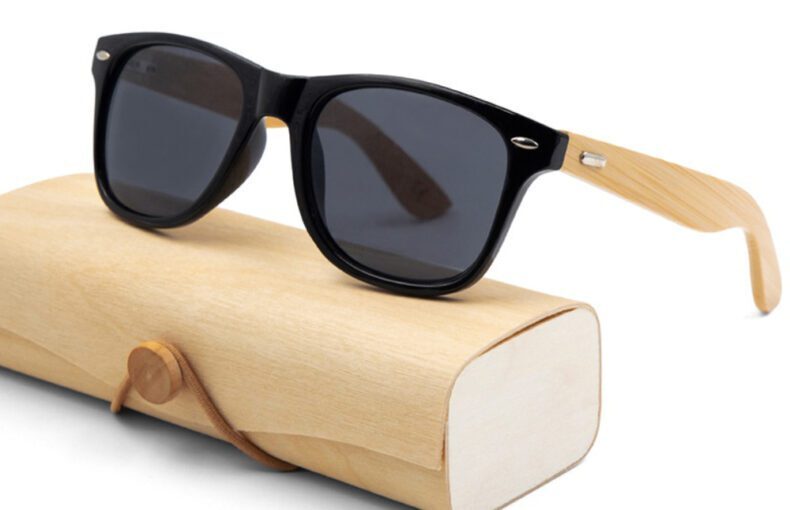 Sunglasses With a Wooden Frame and Black Lens.