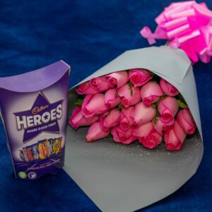 Flower Bouquet of Pink Roses and a Packet of Cadbury Heroes Chocolates