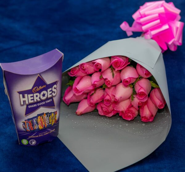 Flower Bouquet of Pink Roses and a Packet of Cadbury Heroes Chocolates