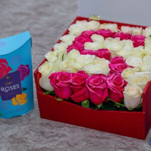 Mixed White & Pink Roses in a Flower Box and Curren Quartz Ladies' Watch and a Packet of Cadbury Roses Chocolates