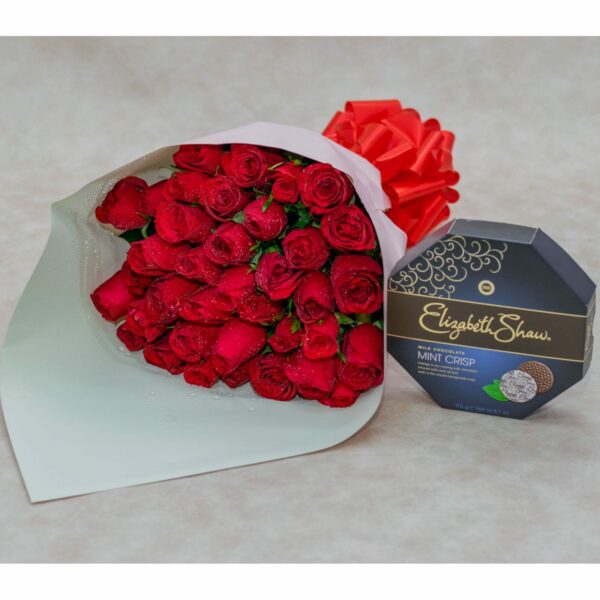 A Bouquet of Red Roses and Chocolates