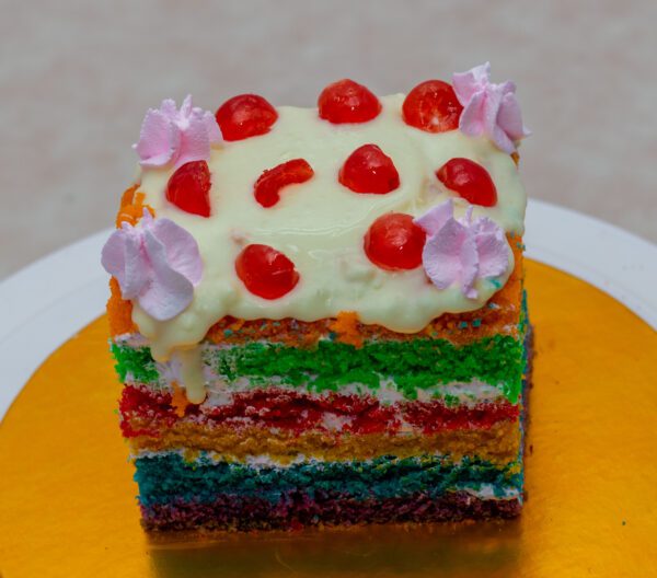 A Slice of Rainbow Cake