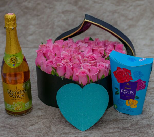 Aurora Flower Box-Pink Roses and Cadbury Roses Chocolates and Rendez Vous White Grape Sparkling Drink- Non-Alcoholic