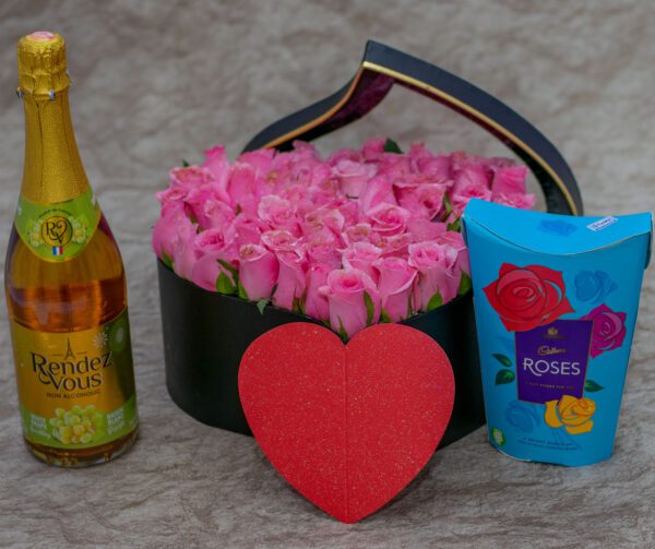 Aurora Flower Box-Pink Roses and Cadbury Roses Chocolates and Rendez Vous White Grape Sparkling Drink- Non-Alcoholic