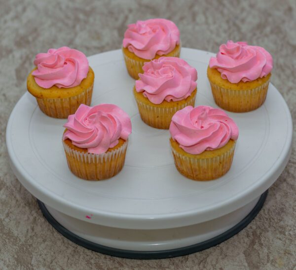 Orange Cupcakes with Pink Vanilla Frosting