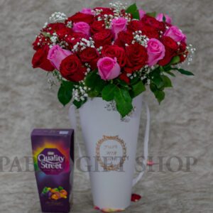 Perfection Red & Pink Roses Flowers in a Vase & Quality Street Chocolates