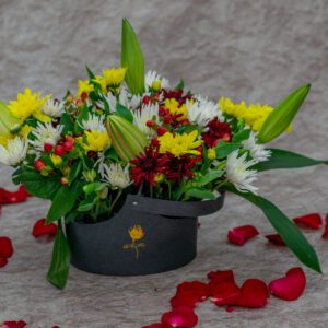 Mixed Flowers in a Black Basket