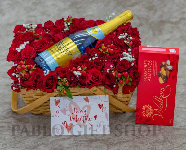 A Basket of Red Roses and Berry Flowers Package