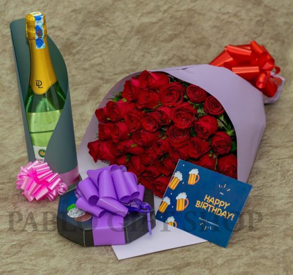 Fresh red rose flowers with Elizabeth shaw chocolate and fragolino wine and a gift card